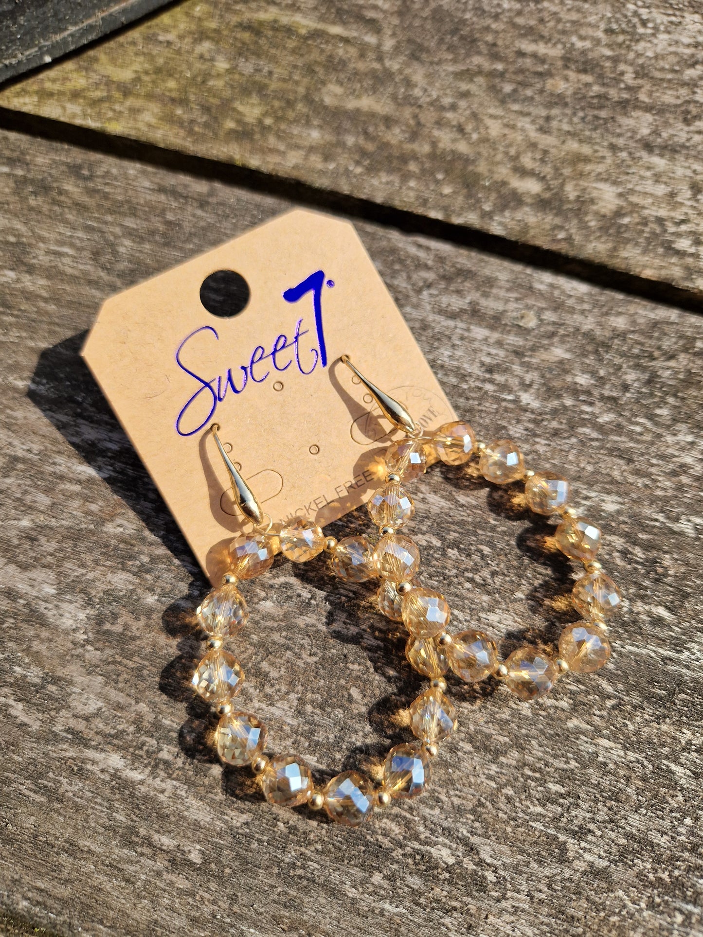Amber glitter bal oorring