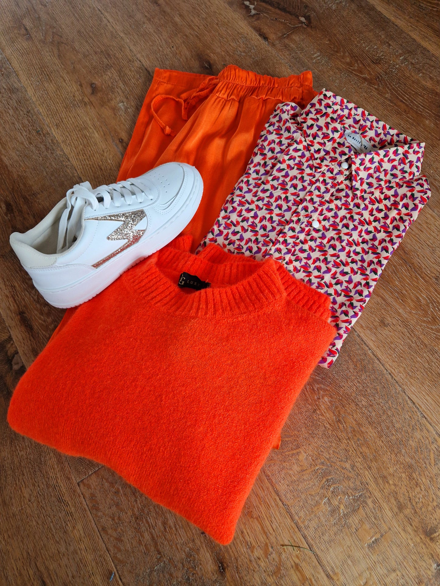 Broek viscose oranje met elastiek en striklint