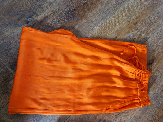 Broek viscose oranje met elastiek en striklint